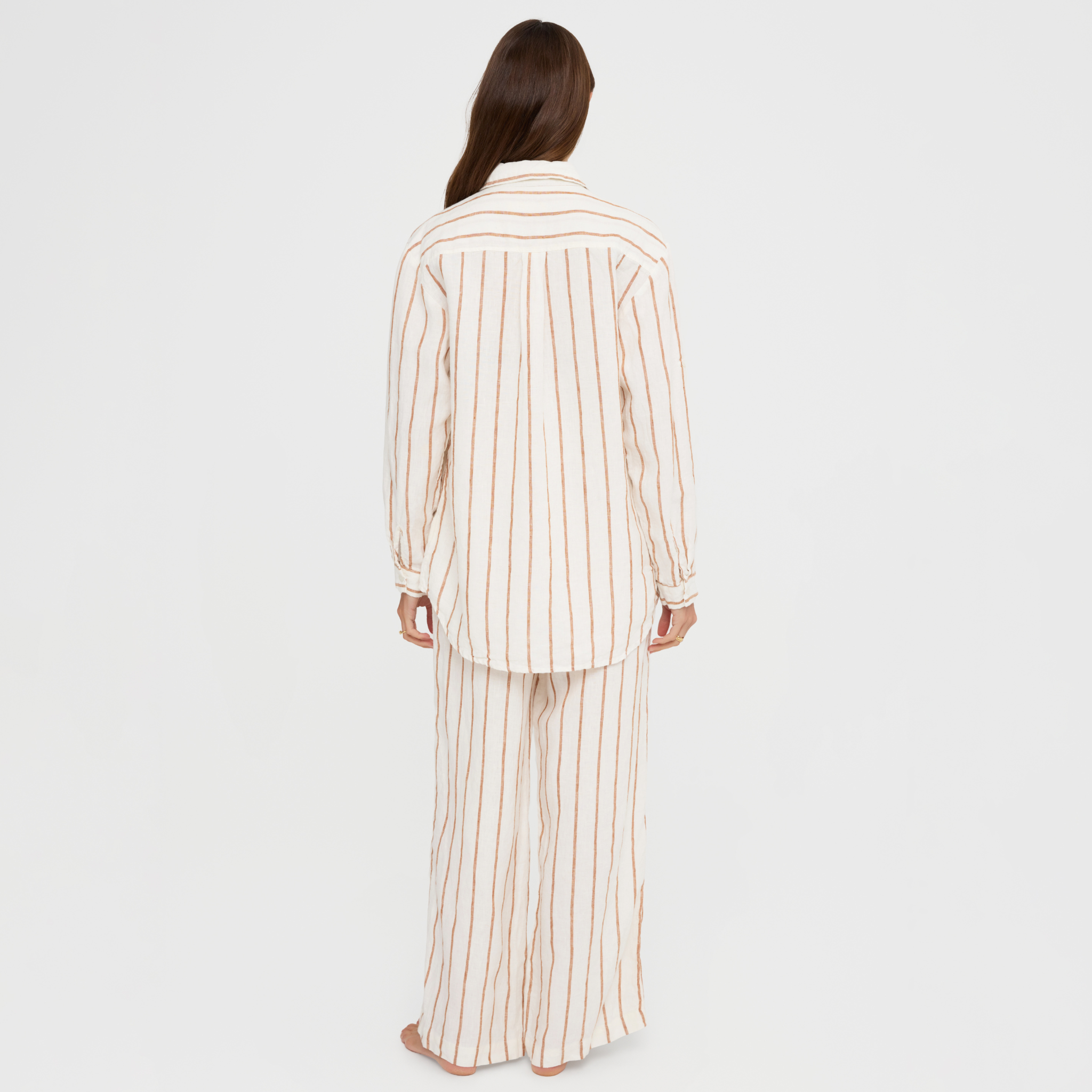 Linen lounge set featuring long sleeve shirt and full-length trousers