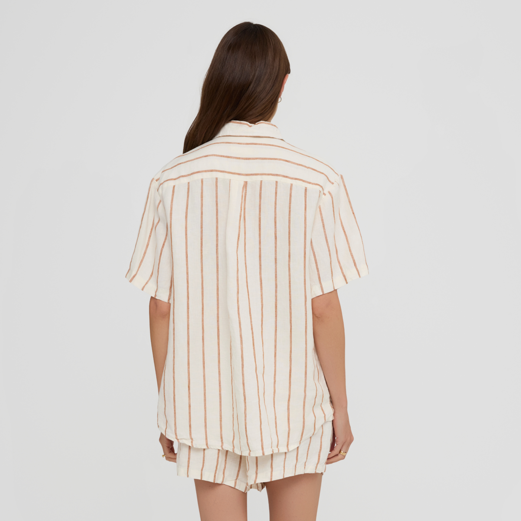 Short sleeve linen sleep shirt featuring chest pocket and relaxed fit