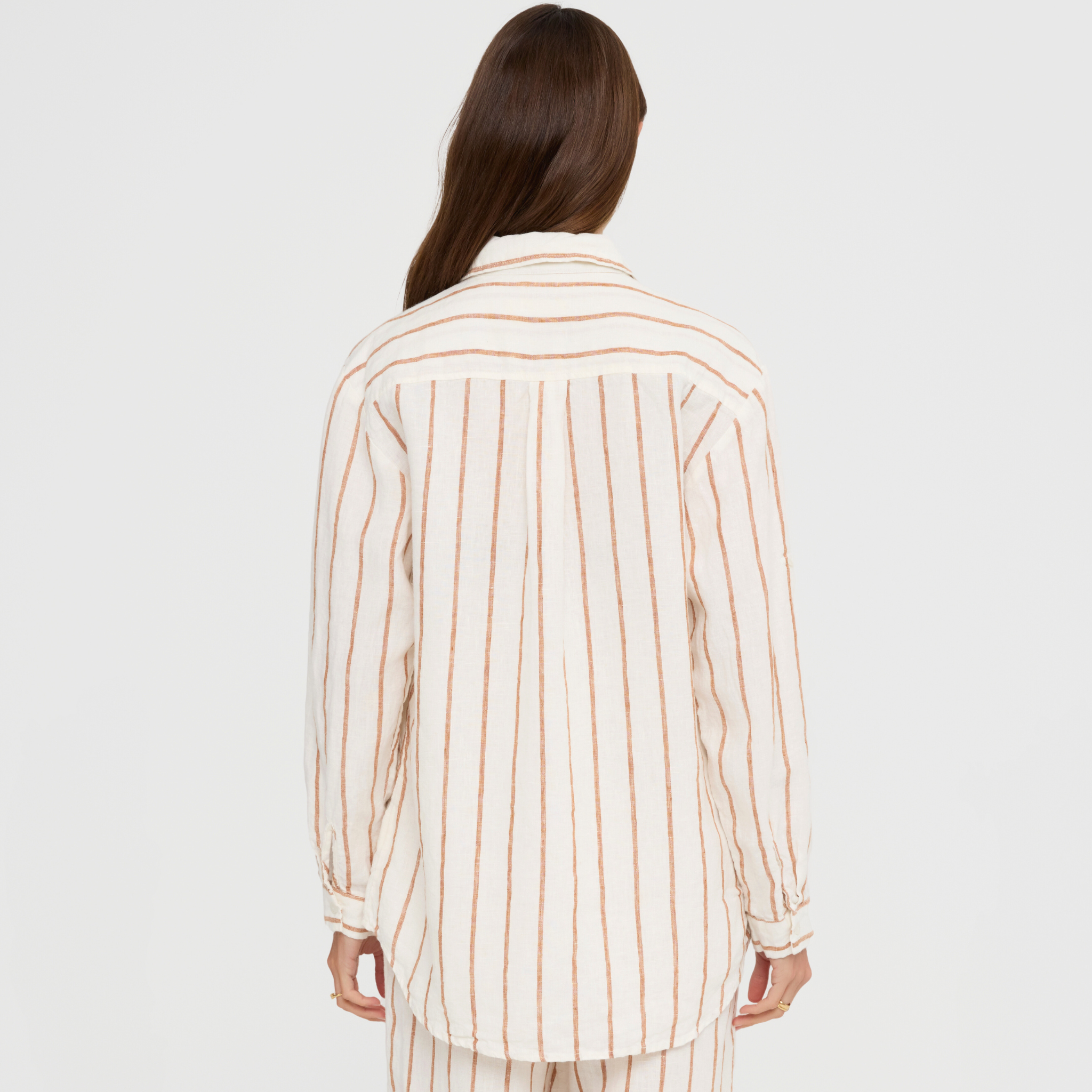 Linen lounge top with pocket, long sleeves, and button front design
